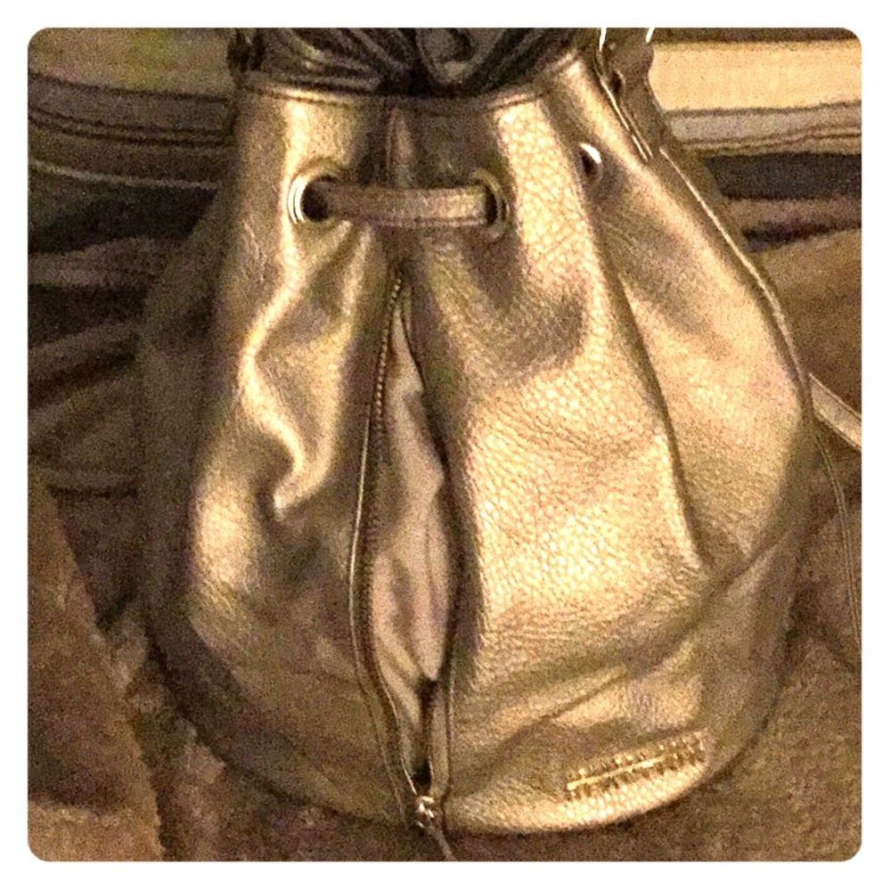 Gold backpack purse...PRICE FIRM